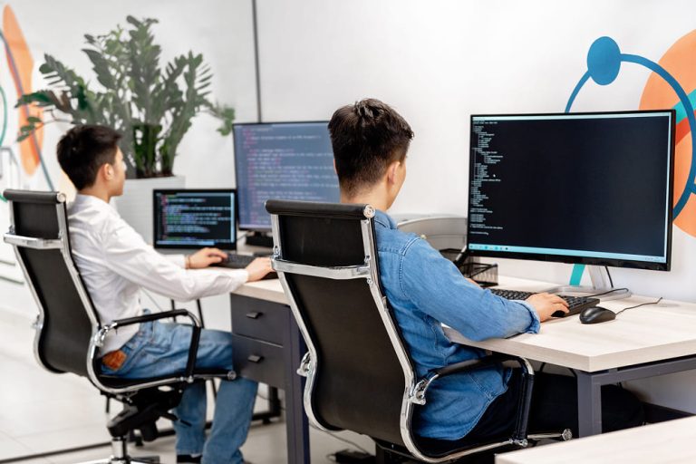 People using computers at work